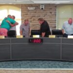 Woodson Departs. Link Takes Seat